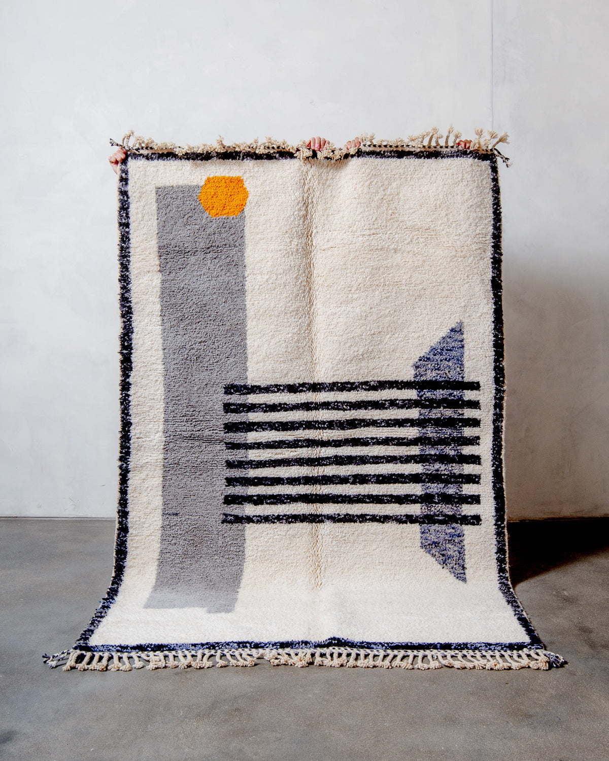 Modern, designer, handcrafted Berber rug from Morocco. Beniourain carpet with beautiful colours and patterns and fluffy wool texture.